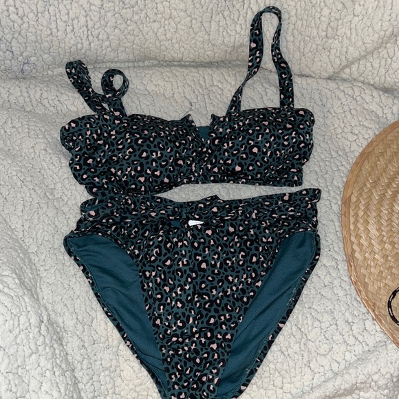 Other - This a cute cheetah looking bikini set worn this a couple times.